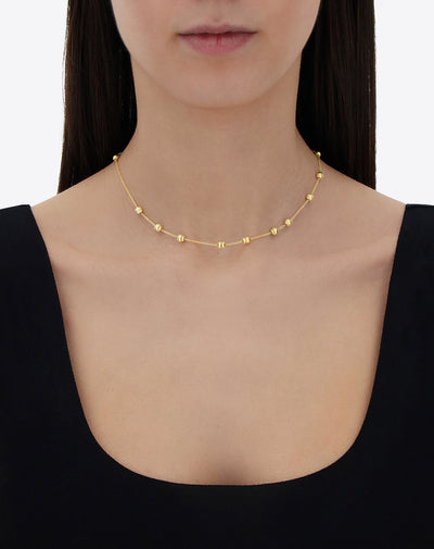 Collana girocollo "soffio" con boules in oro