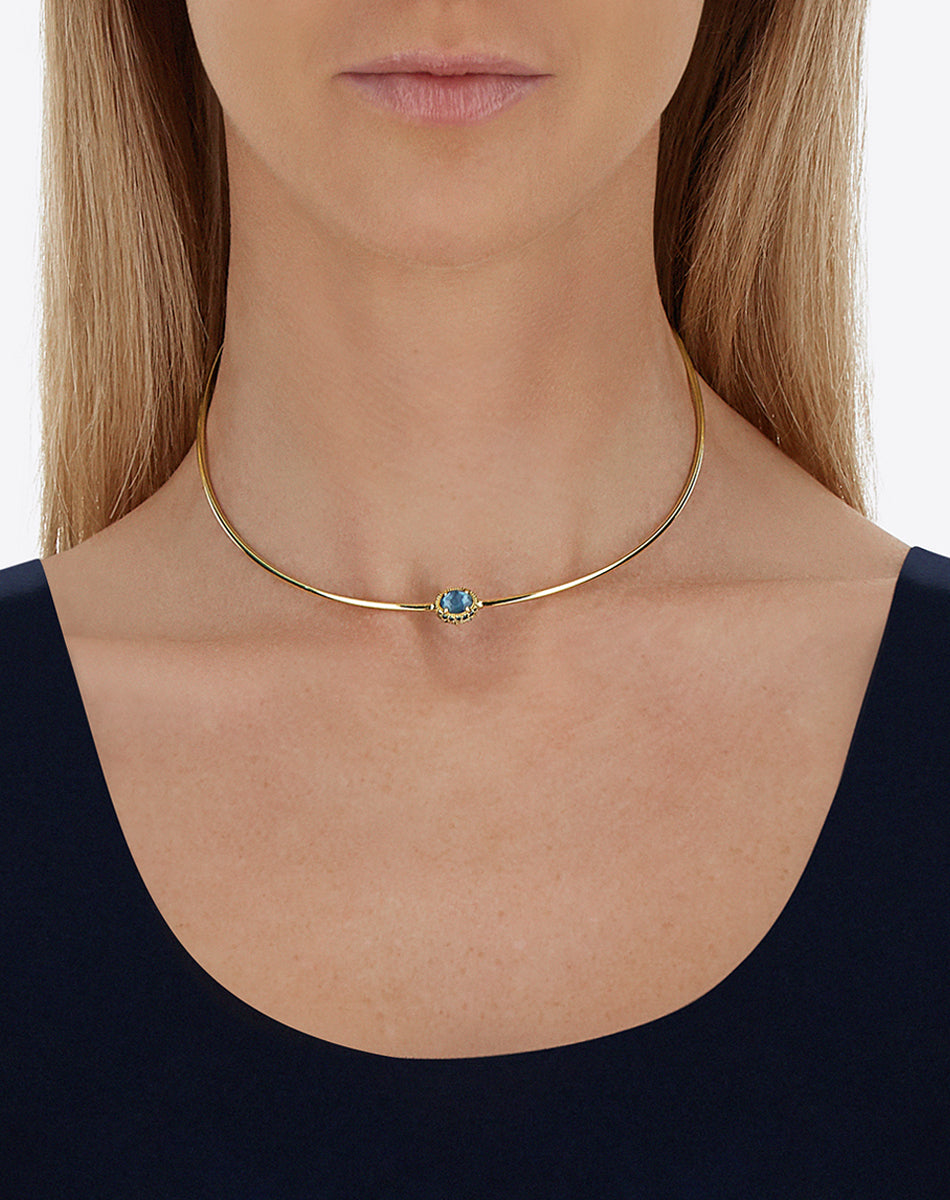 “Reverse Baby” gold choker necklace with blue diamonds, Swiss light blue topaz, green sapphires and London blue topaz