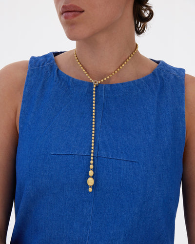 Ikonische wandelbare Halskette "IVY" slim mit handgravierten Boules aus Gelbgold und Diamanten (kurz)
