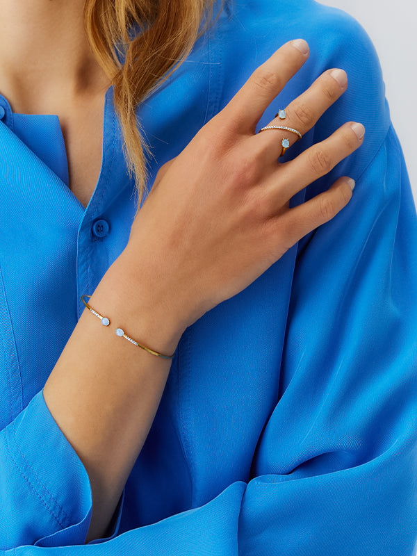"azure" gold, diamonds and aquamarine criss cross ring