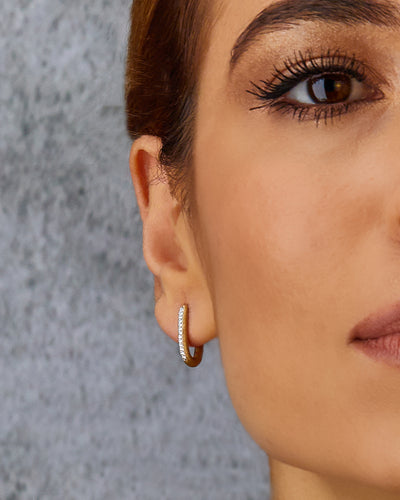 "Libera" small gold square hoop earrings with diamonds