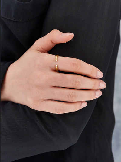 "libera" gold ring with diamond accents