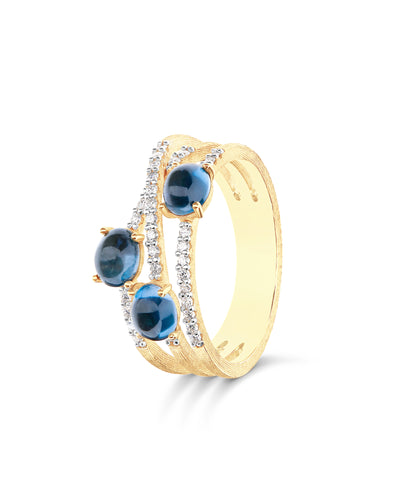 Anello "DANCING AZURE" a tripla fascia incrociata in oro, diamanti e topazio London blu
