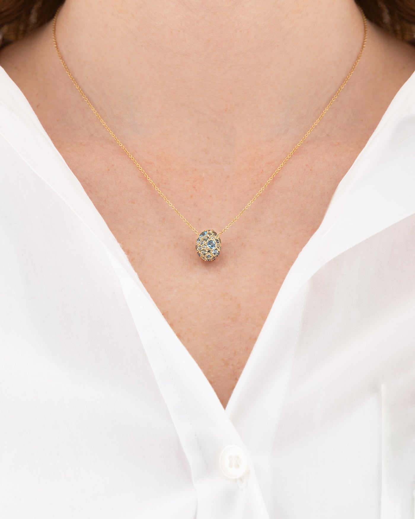 "reverse" gold, blue diamonds, swiss blue topaz, green sappgires and london blue topaz double-face necklace