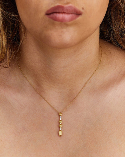 "dancing Élite" gold and diamonds contemporary pendant