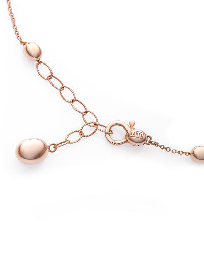 Bracciale "soffio" con boules in oro rosa